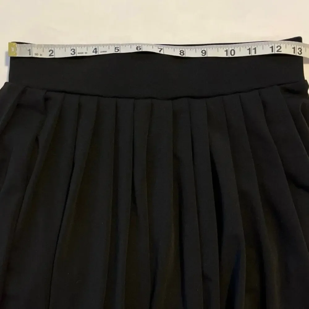 Indero Black Tennis Skort Womens Size L Pleated Feminine Pickleball Stretch Mini